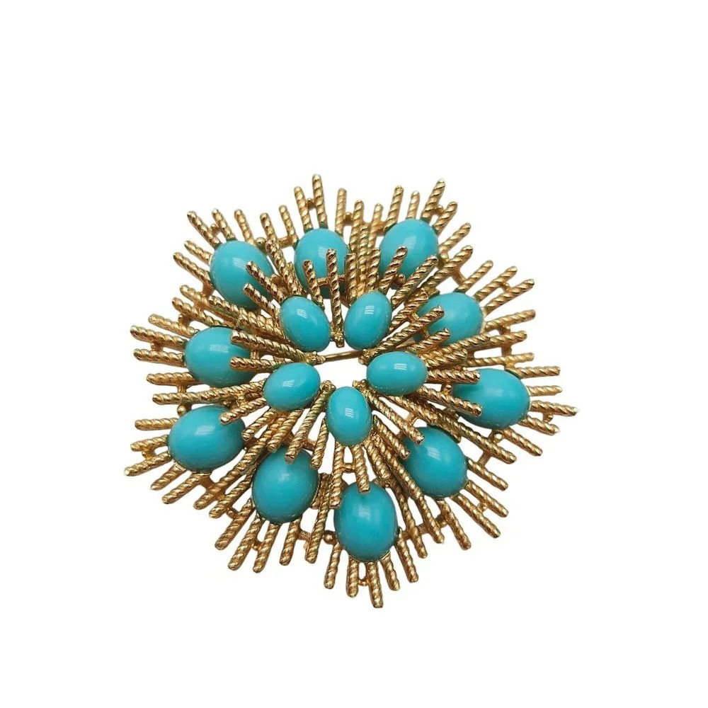 Susan Caplan for Avon 1972 Starburst Faux Turquoise Cabochon Gold Tone Brooch